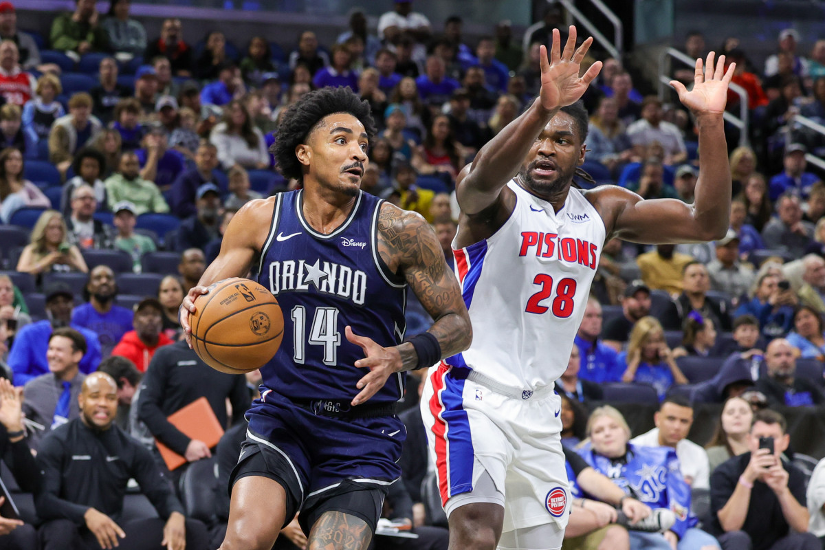 Orlando Magic guard Gary Harris (14) looks to pass against Detroit Pistons center Isaiah Stewart (28) during the first quarter at Amway Center.